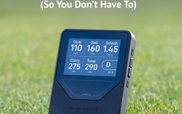 Golfer using a budget launch monitor in an indoor golf simulator setup.