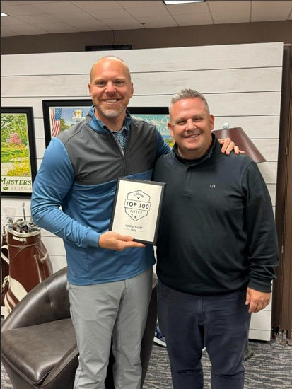 Ryan Austad and Brian Winge from Callaway presenting the award