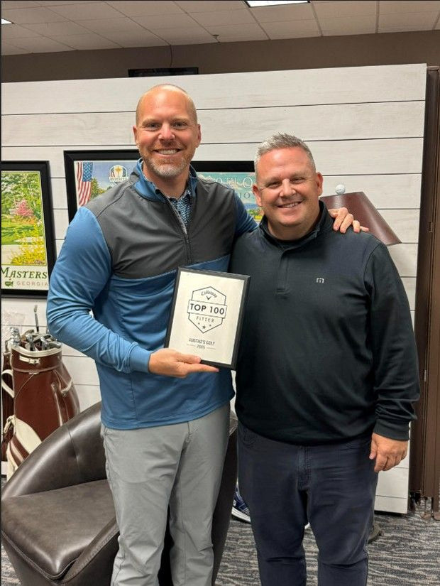 Ryan Austad and Brian Winge from Callaway presenting the award